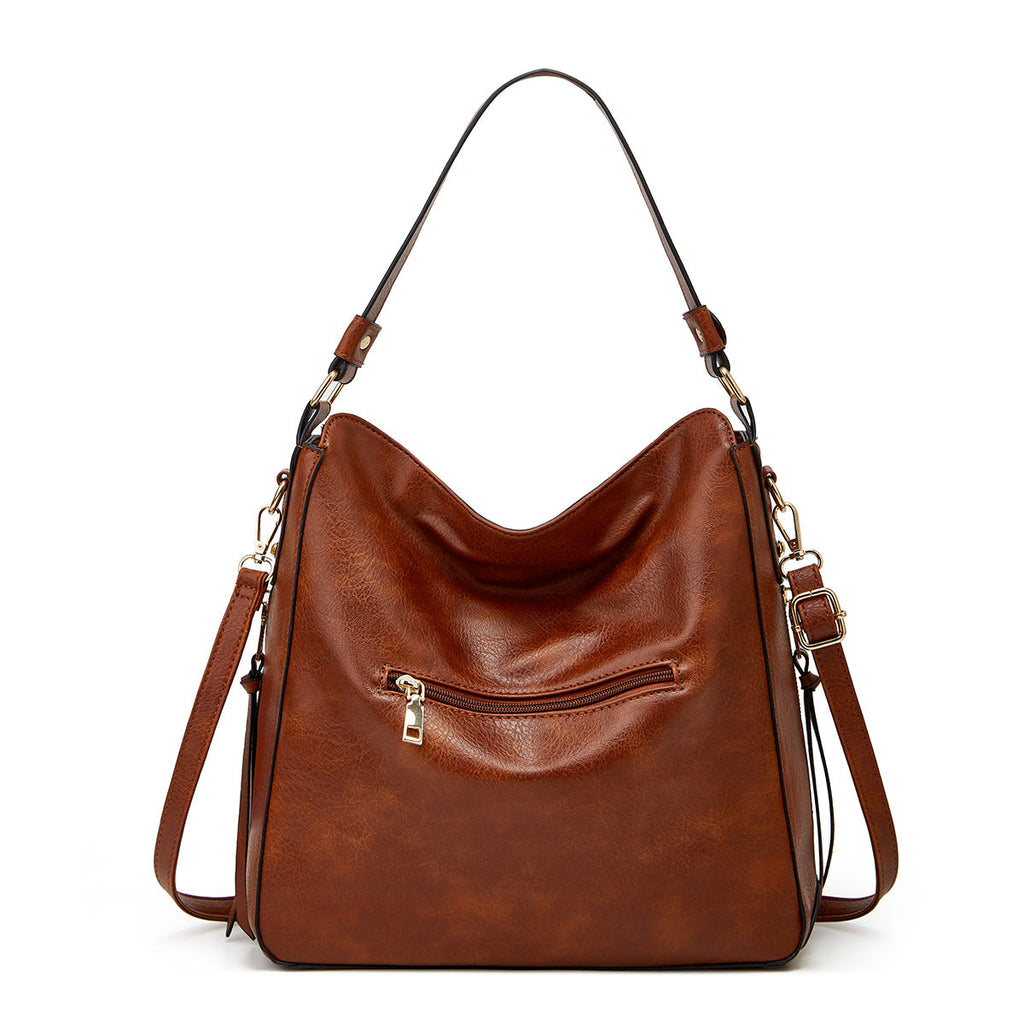 Bolso hobo de lujo en cuero estampado con antirrobo + monedero tipo pouch GRATIS