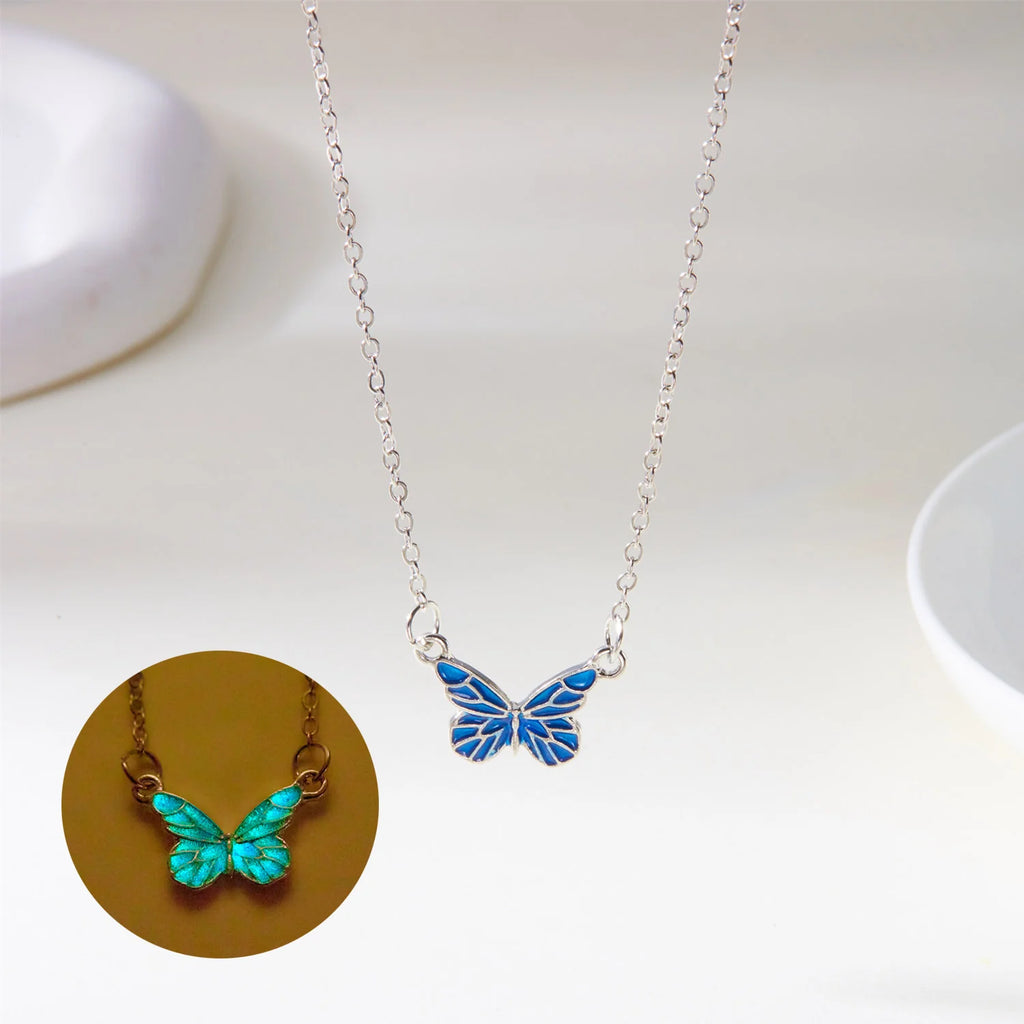Conjunto de collar y pulsera con dije de mariposa luminosa