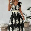 Candela | Vestido maxi barroco con escote en V